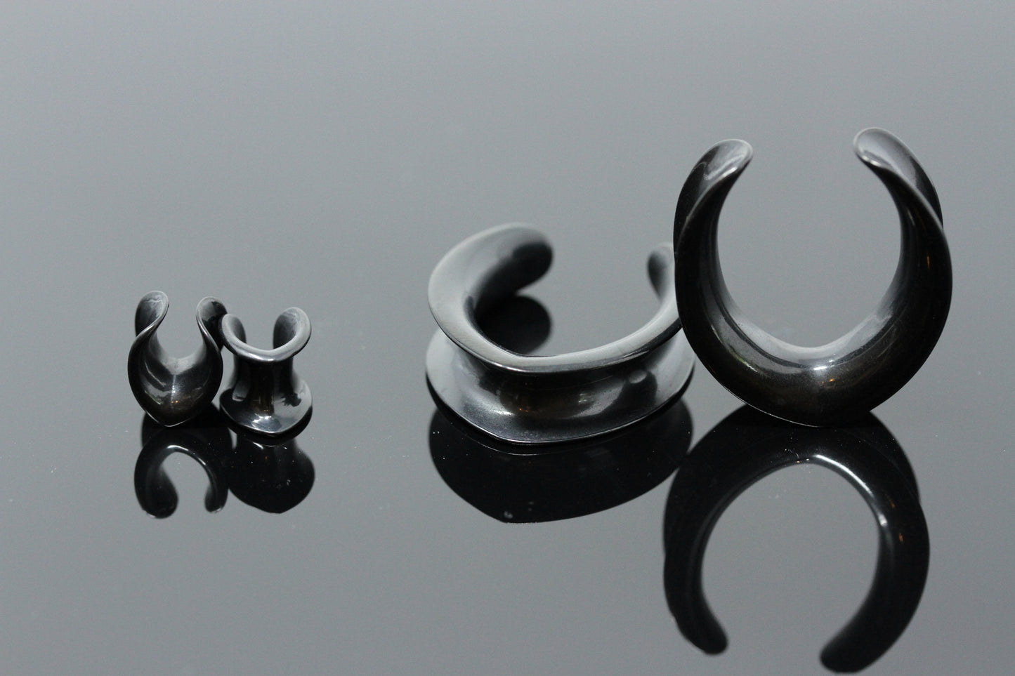 Black saddle plugs