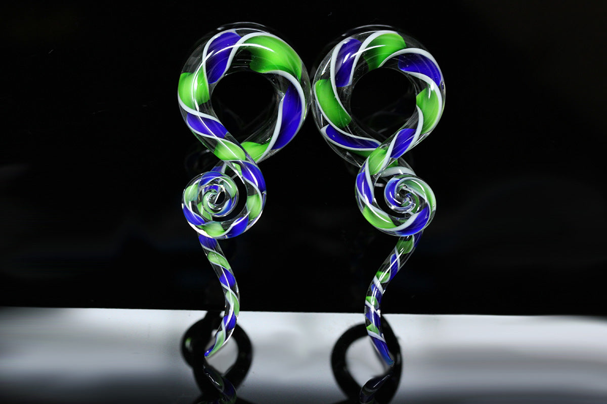 twisting ear gauges blue and green