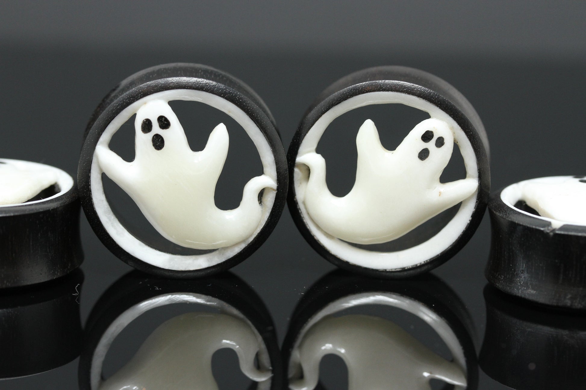 Wood and bone ghost tunnel plugs