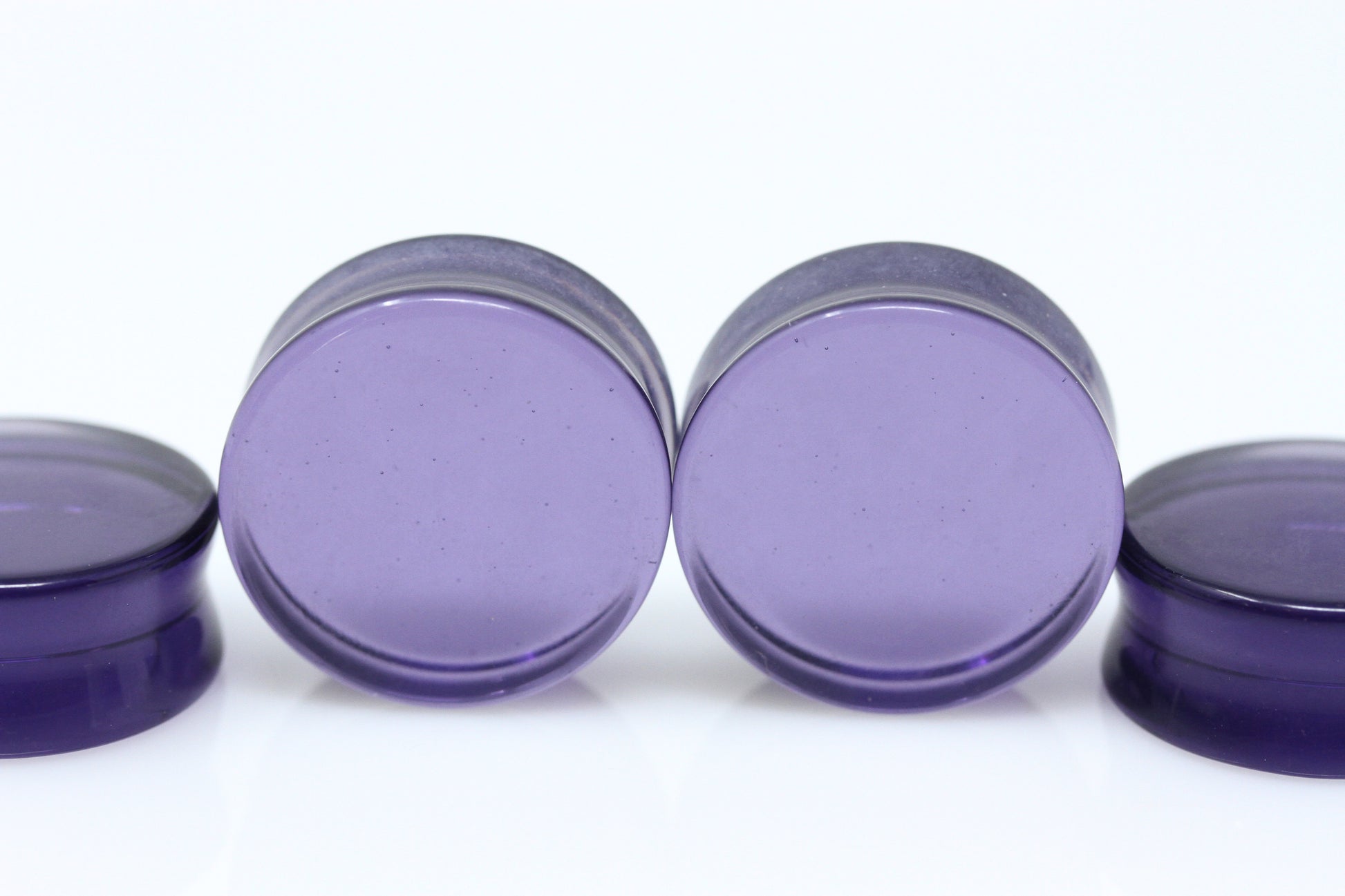 Purple double flare glass plugs