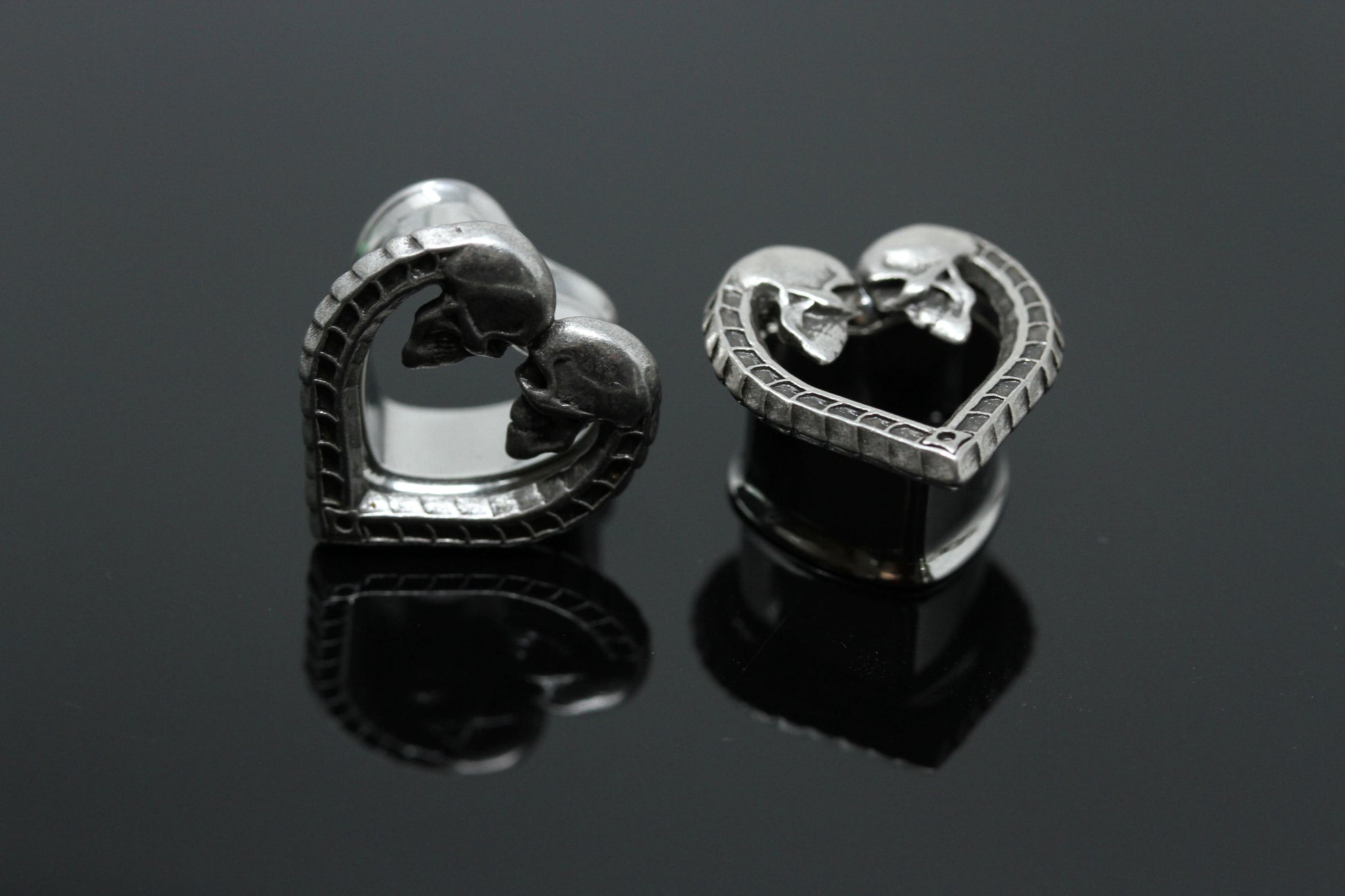 Heart shaped stainless steel tunnel plugs