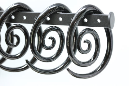 Spiral weights stretched ears