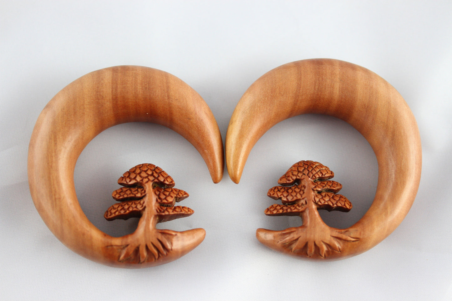 Bonsai carved wood stretching hangers