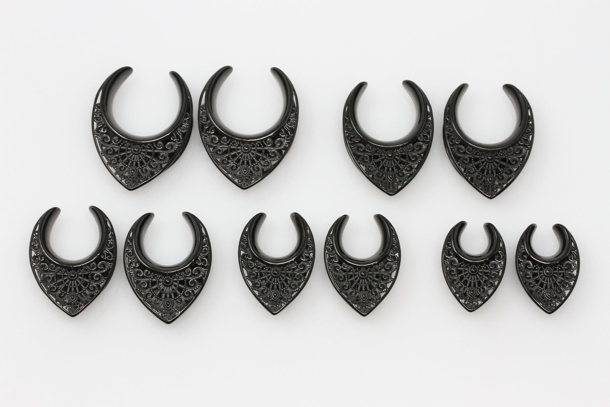 Black stainless steel saddles for stretched ears