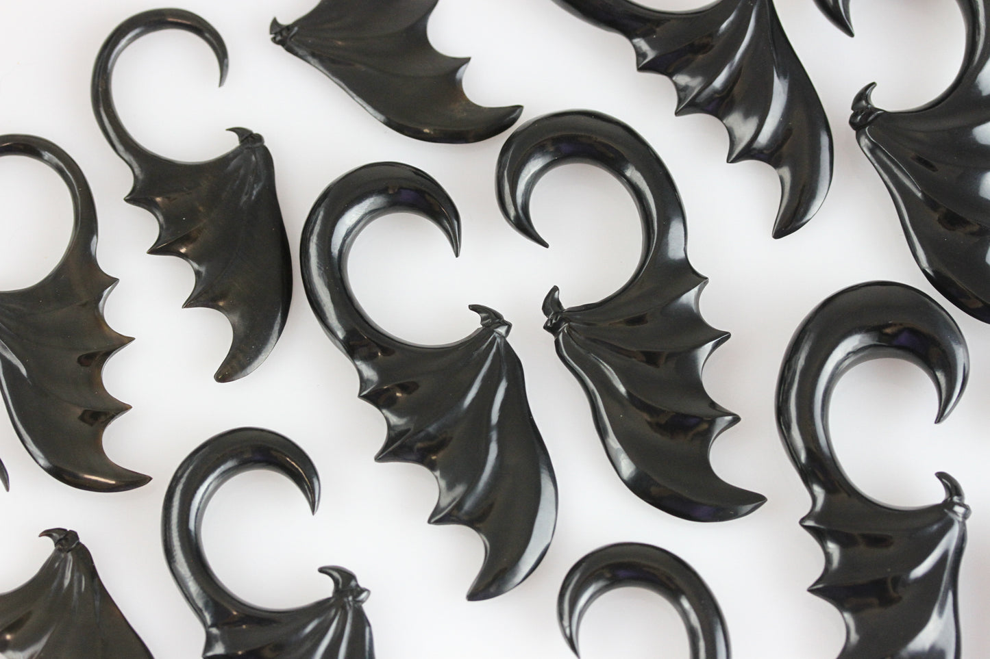 Bat wing plug hangers