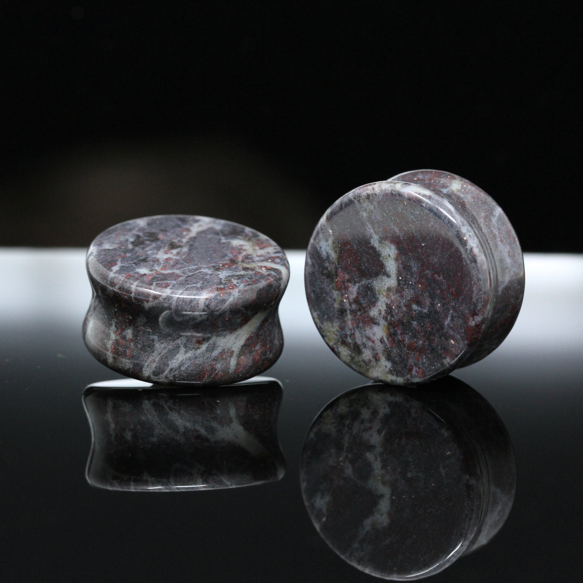 Black magma gauged ear plugs