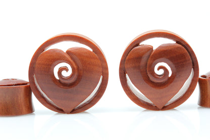 Carved heart plugs