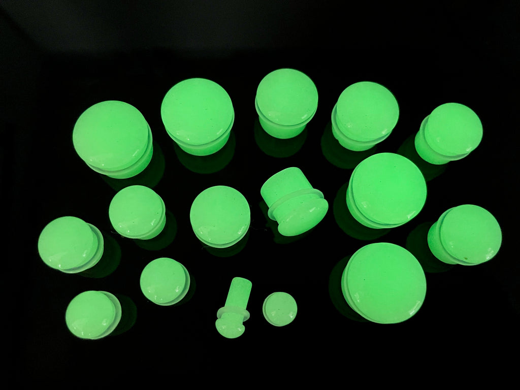 Single flare glow in the dark plugs