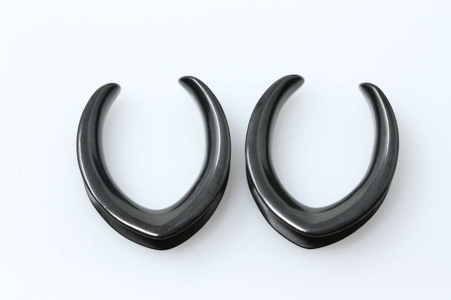 Plain black stainless steel saddles