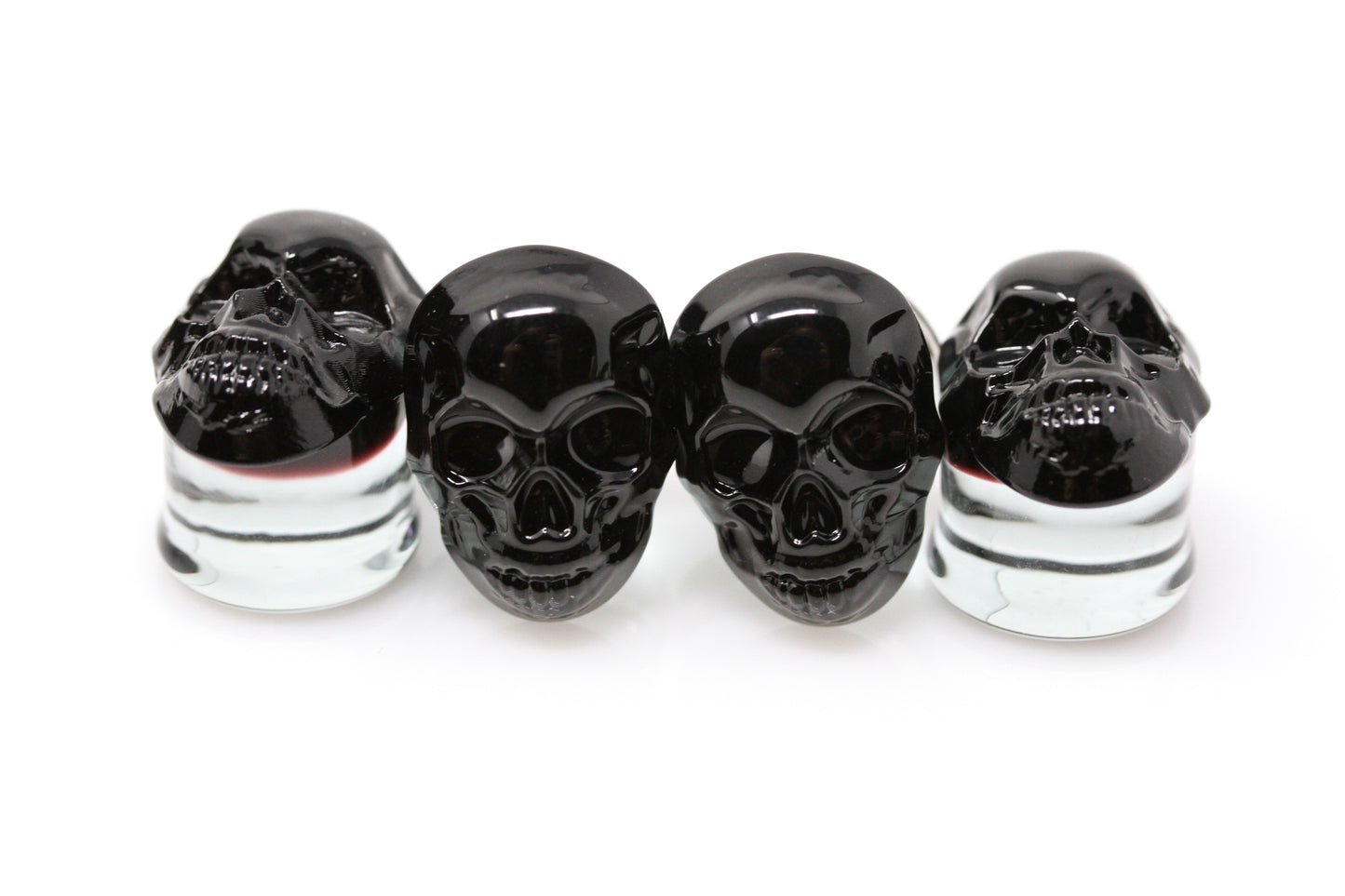black glass skull plugs