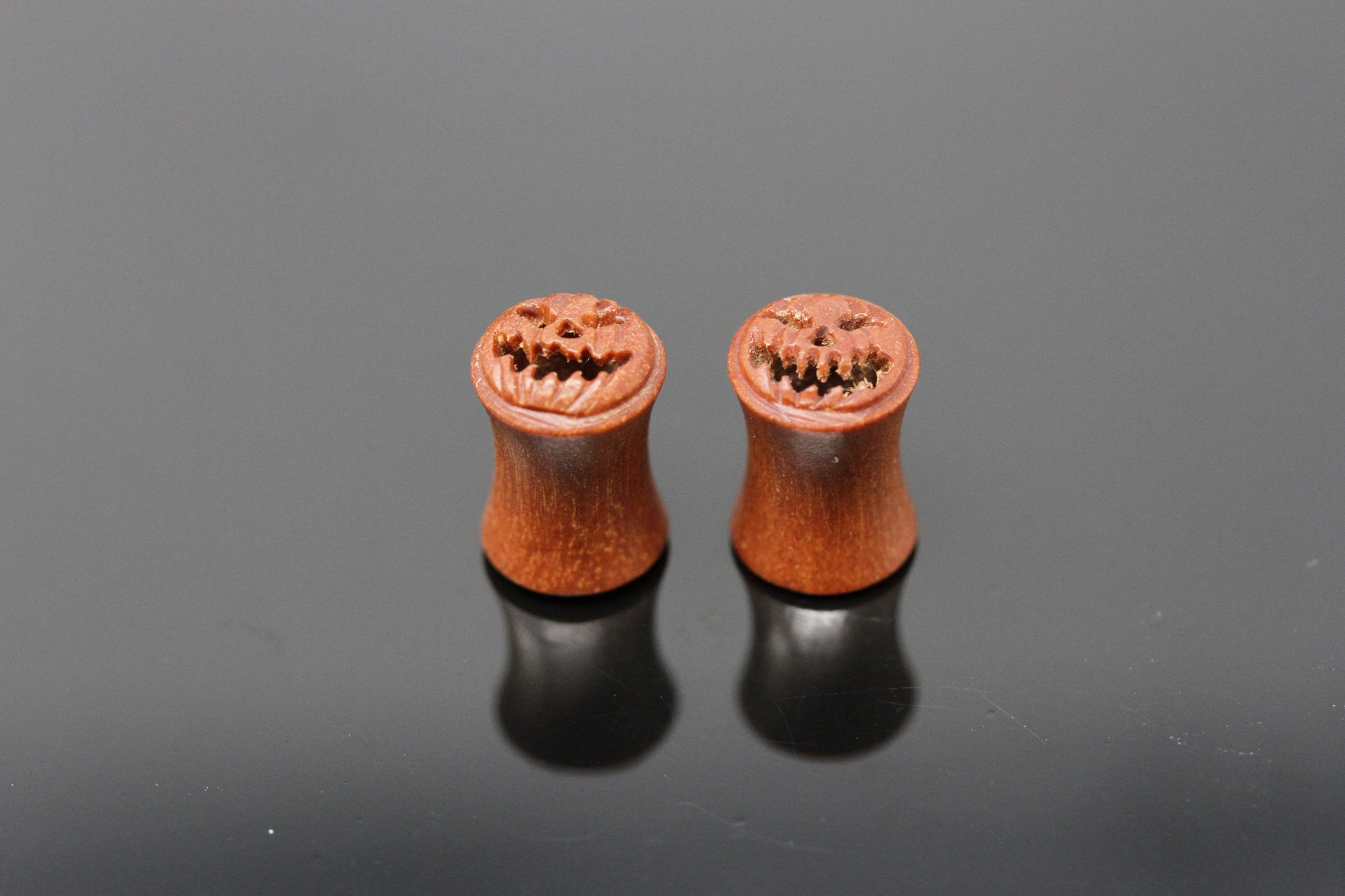 Carved pumpkin plugs
