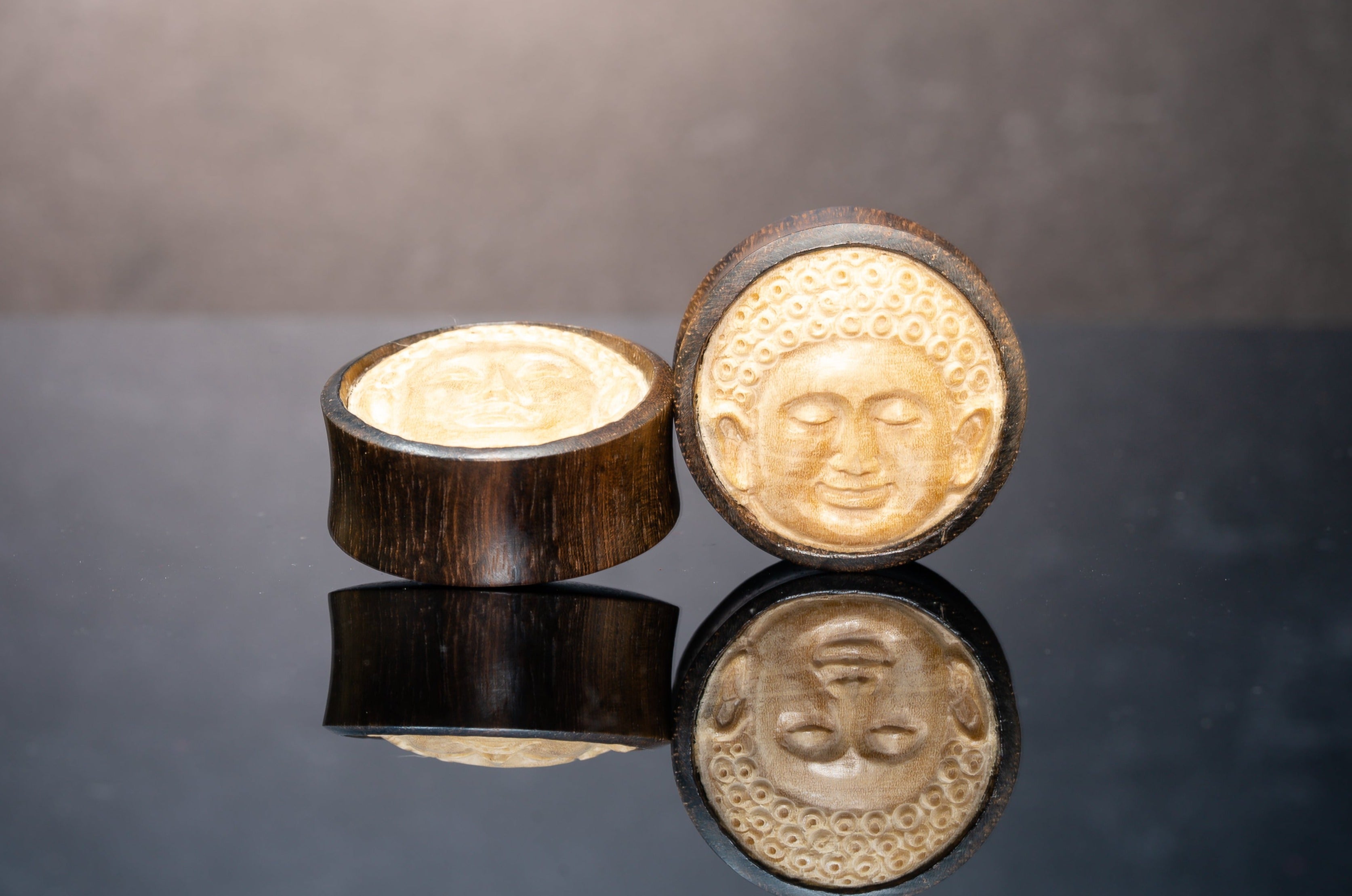 thumbnail interactive-video image 1 of Pair Wood Buddha Saddle Plugs - 12mm To 30mm Ear Tunnels, Brown, Helix 1 of 4