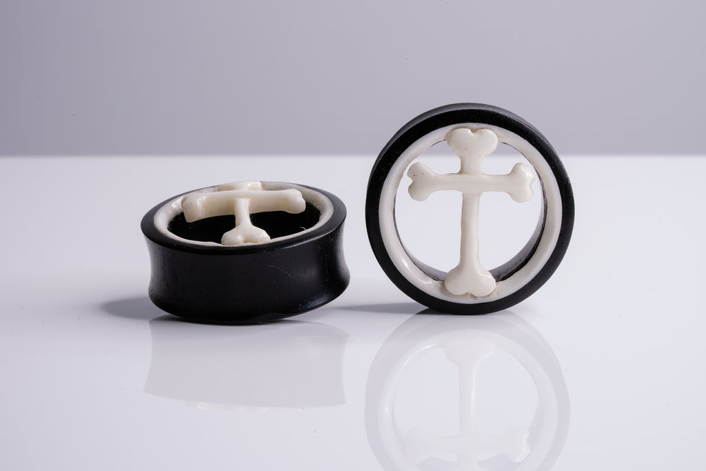 cross and bone plugs