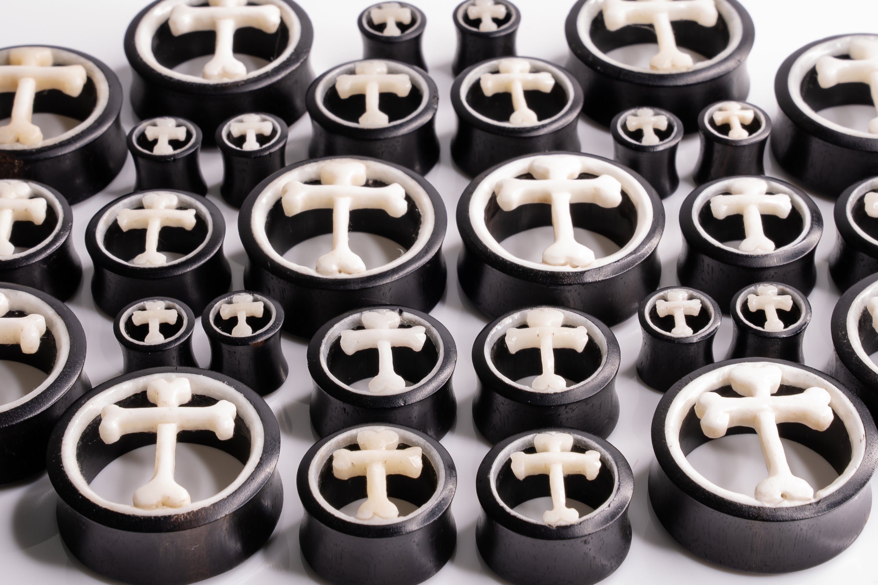 Bone Plugs | Tunnels | Hangers | Stretched Ears | Gauges – Two Feather ...