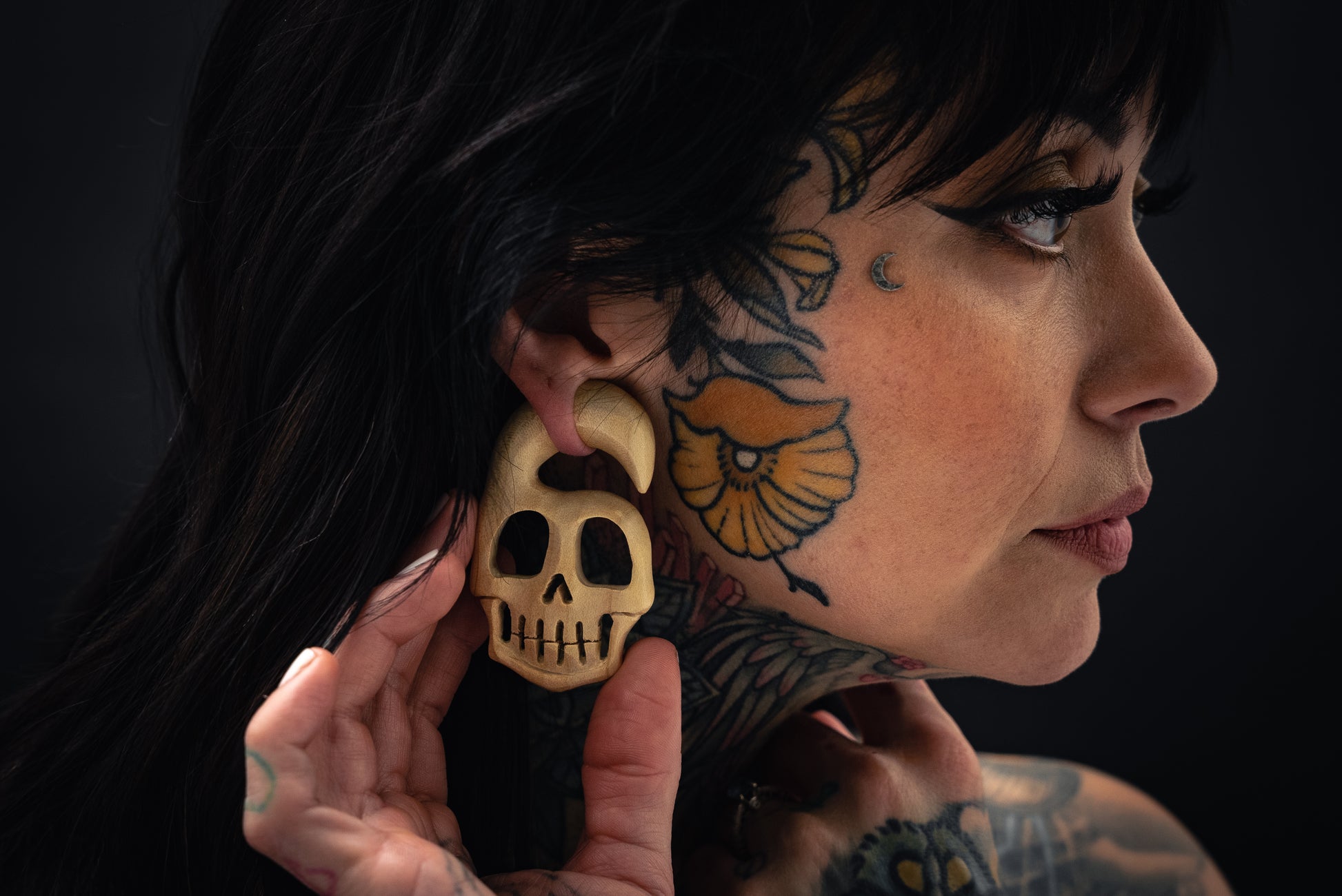 stretched ear wood skull