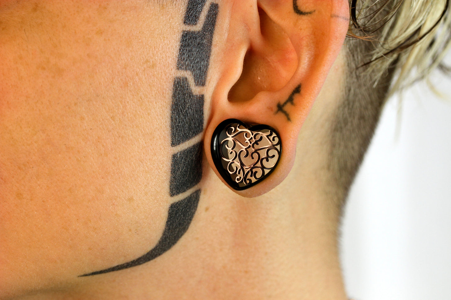 stretched ear heart plugs